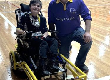 Lachy with his new wheels - PowerChair Round @ Hills United Football Club